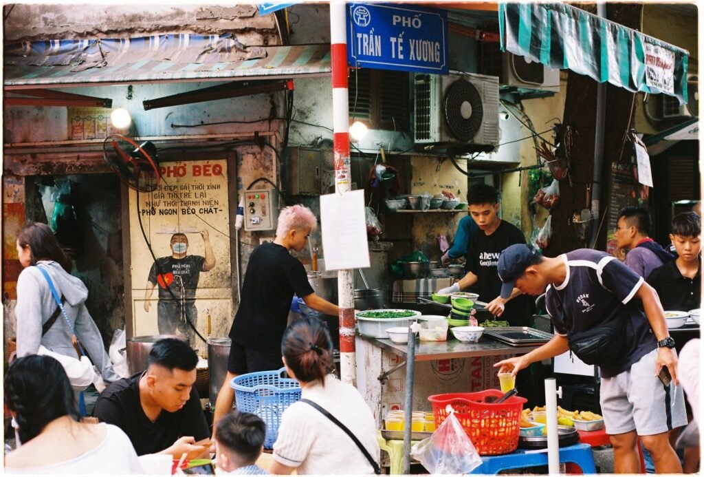A busy street-food stall in Hanoi