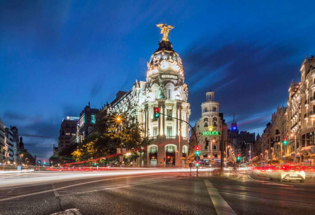 The Metropolis Building on Gran Vía, Madrid, at dusk