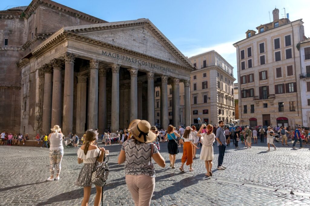 Visitors in the piazza in front of the Pantheon in Rome
